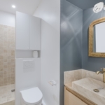 La salle de bain rénovée - appartement de 120m2 Paris 10è